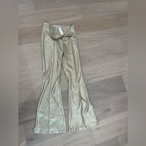Gold metallic shiny pants. NEVER WORN IN AMAZING CONDITION.